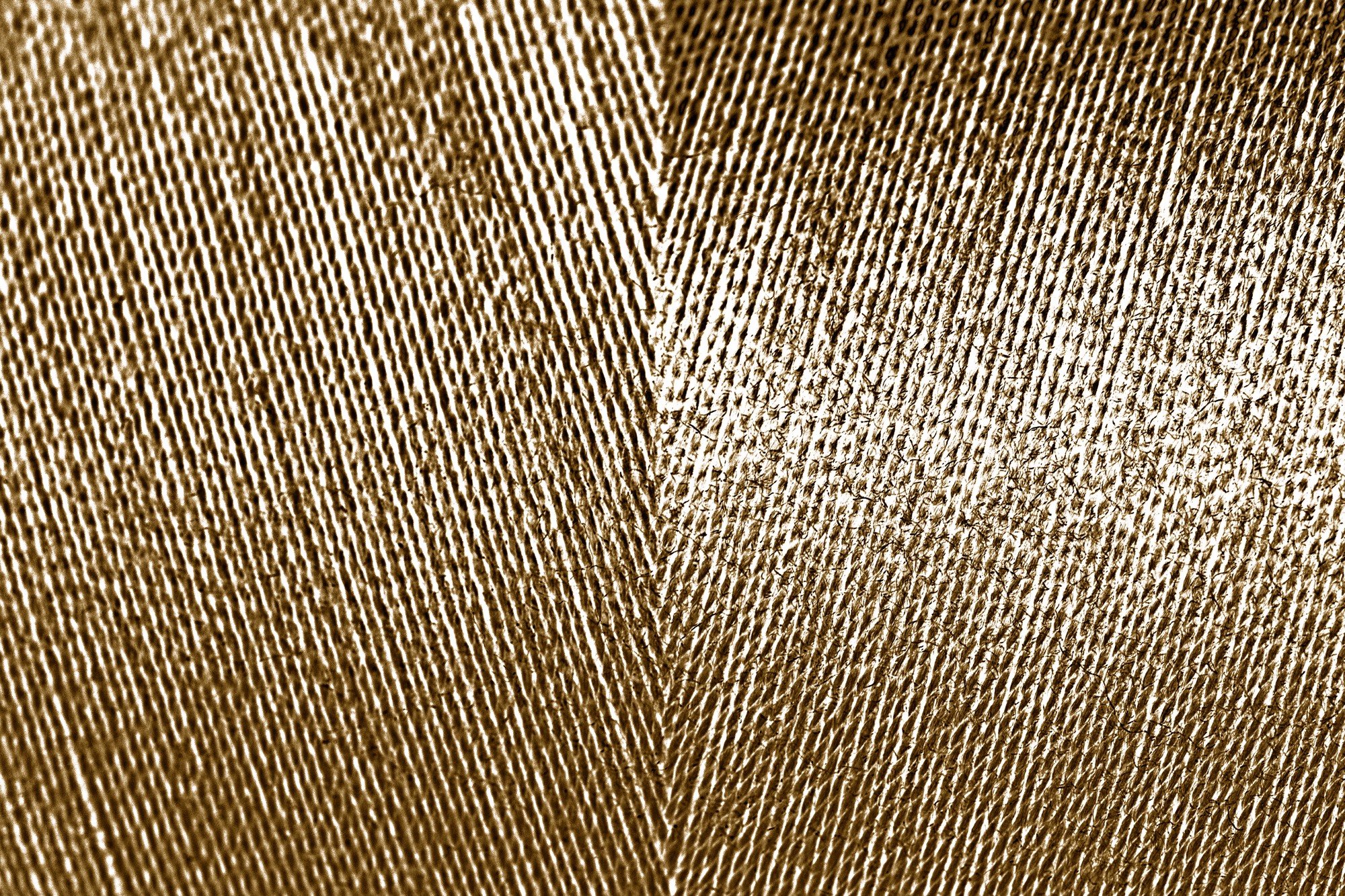 close-up texture of metallic thread embroidery