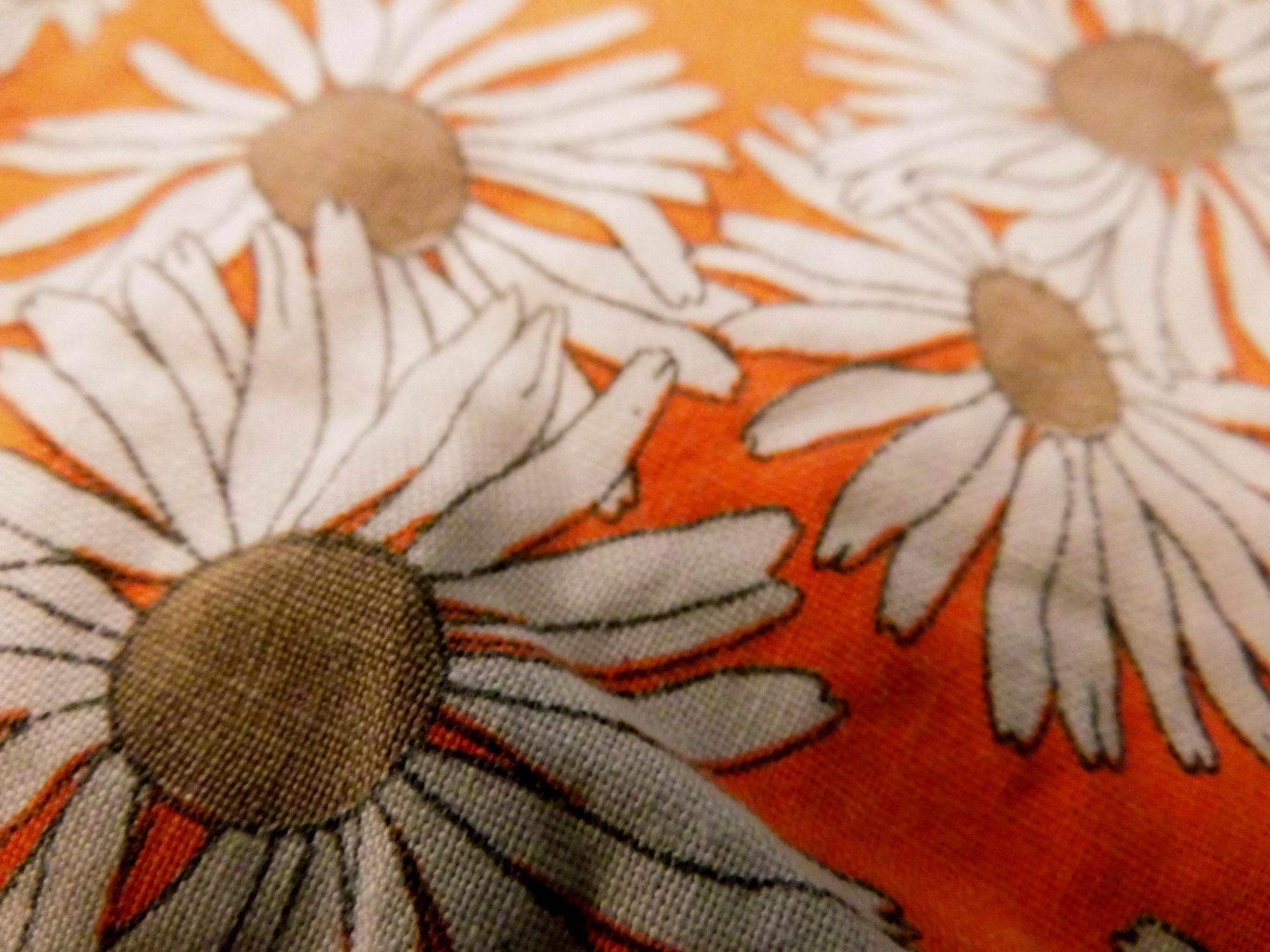 close-up of premium embroidered floral patch on linen
