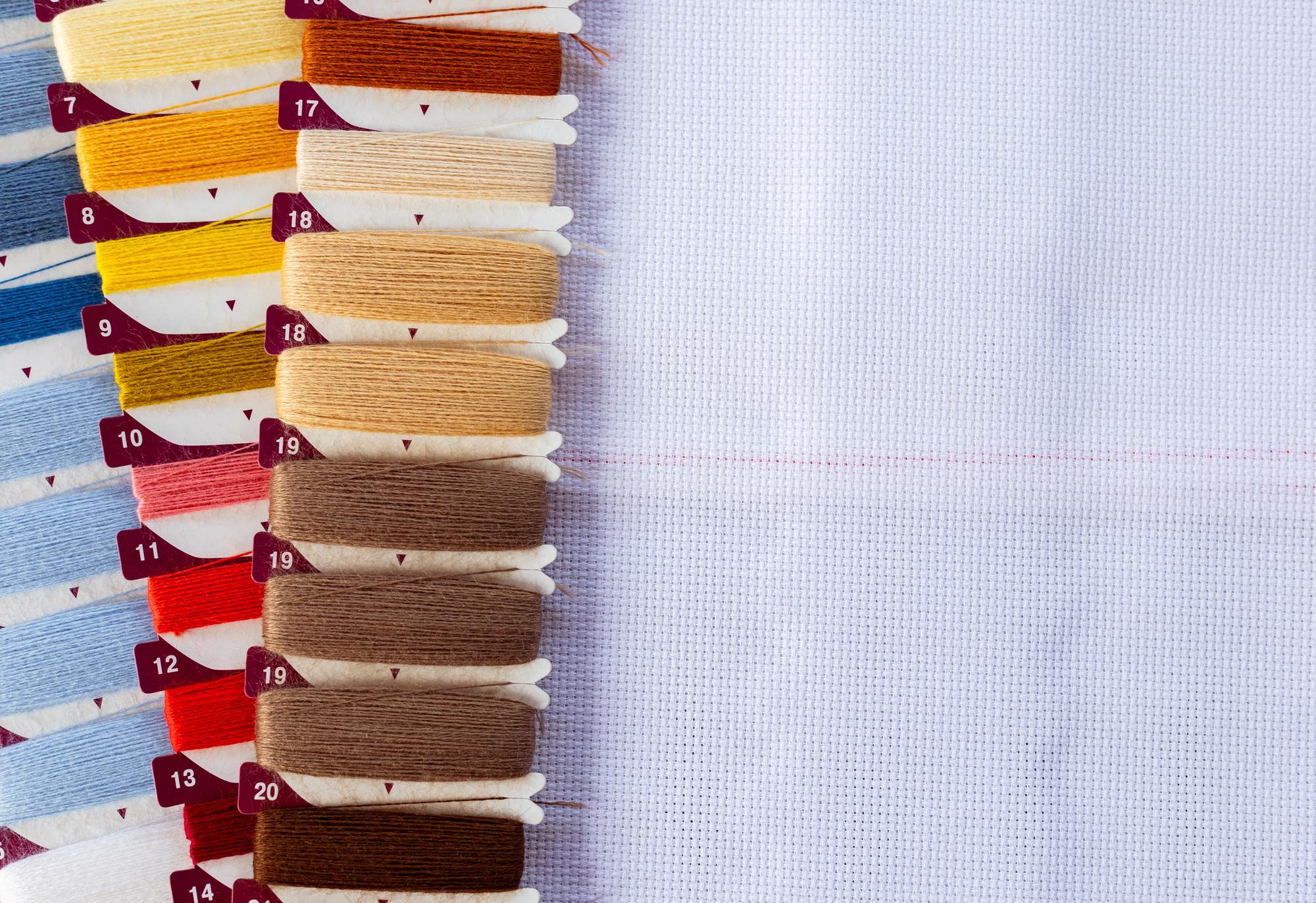 stack of embroidered labels and swatches